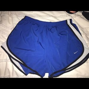 Blue NIKE running shorts